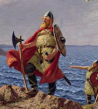 Viking warriors landing on beach.